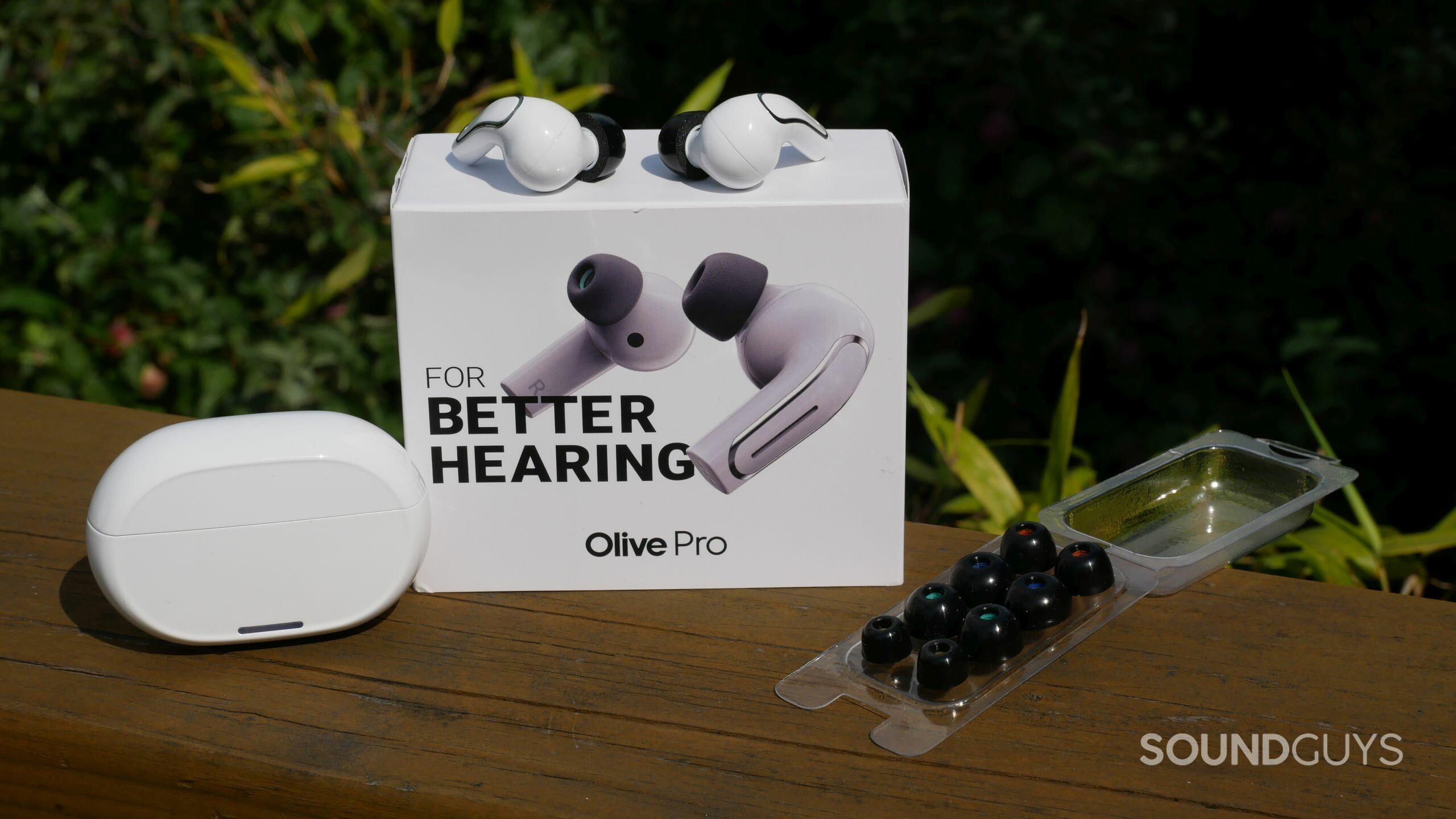 Olive Union Olive Pro earbuds, charging case, ear tips, box Olive Union Olive Pro earbuds with charging case and foam ear tips.