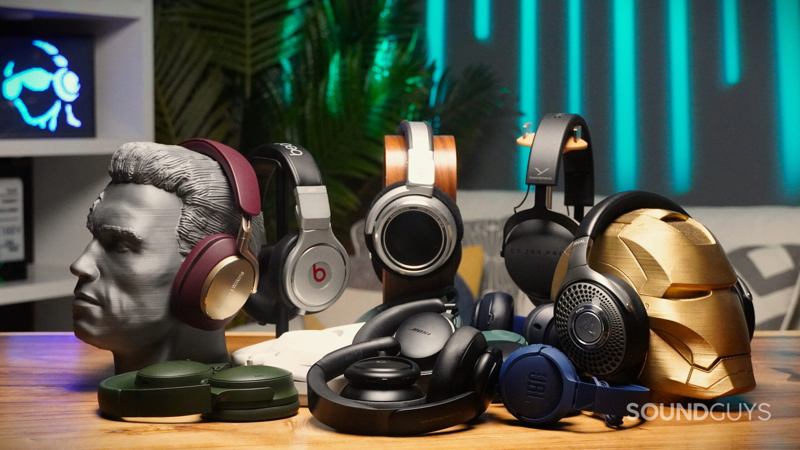 headphones hero (2) a pile of headphones on a table